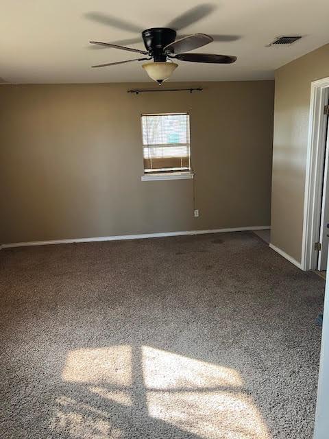 empty room with ceiling fan