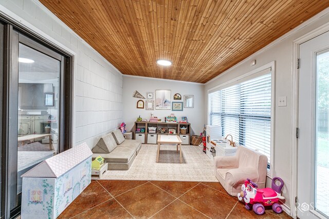 living room with tile patterned flooring, crown molding, wooden ceiling, and plenty of natural light