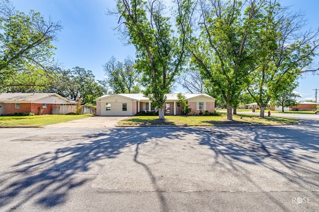 2029 China St, Brady, TX 76825 - ranch-style house featuring concrete driveway