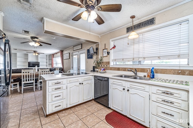 2029 China St, Brady, TX 76825 - kitchen featuring black appliances, ceiling fan, a textured ceiling, a peninsula, and open floor plan