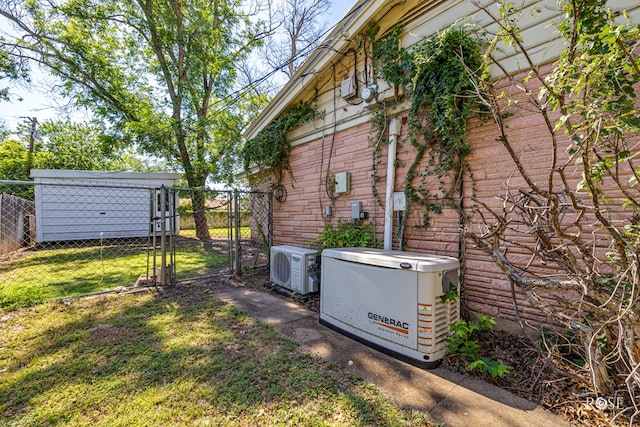 2029 China St, Brady, TX 76825 - view of side of property with a gate and a cooling unit