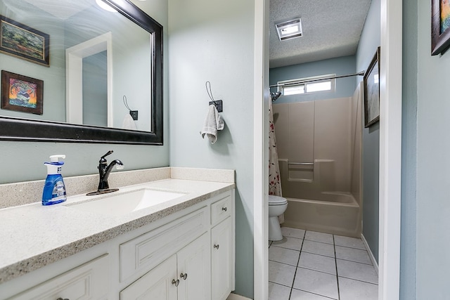 full bathroom with shower / tub combo with curtain, vanity, toilet, tile patterned floors, and a textured ceiling