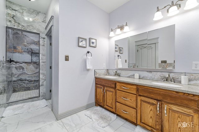 bathroom featuring a tile shower and vanity