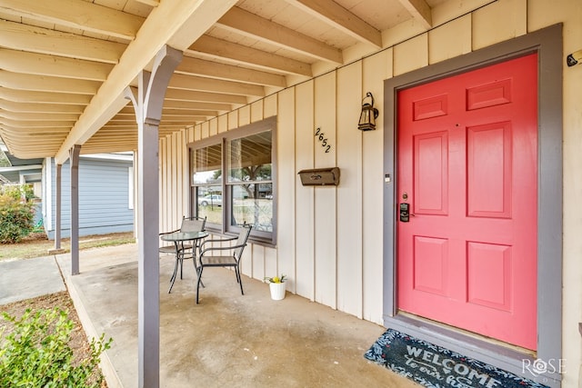 doorway to property with a porch