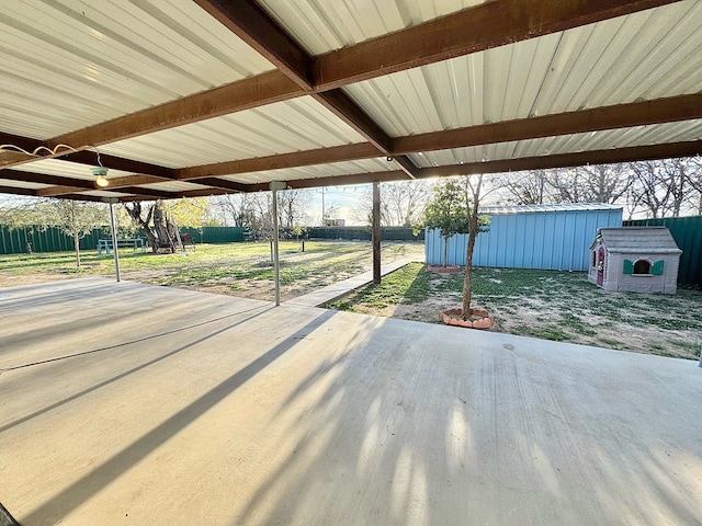 view of patio / terrace with a storage shed