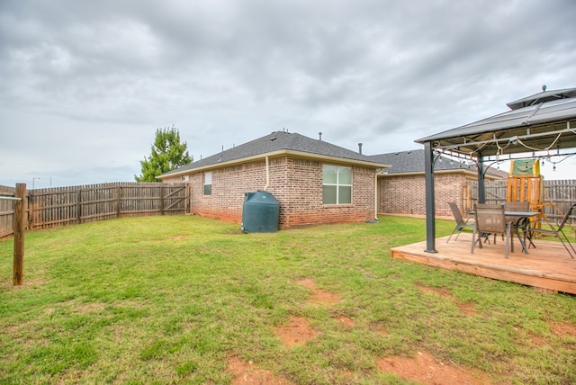 4974 Scarlet Oak Dr, San Angelo, TX 76904 - fenced backyard featuring a gazebo, a deck, and outdoor dining space