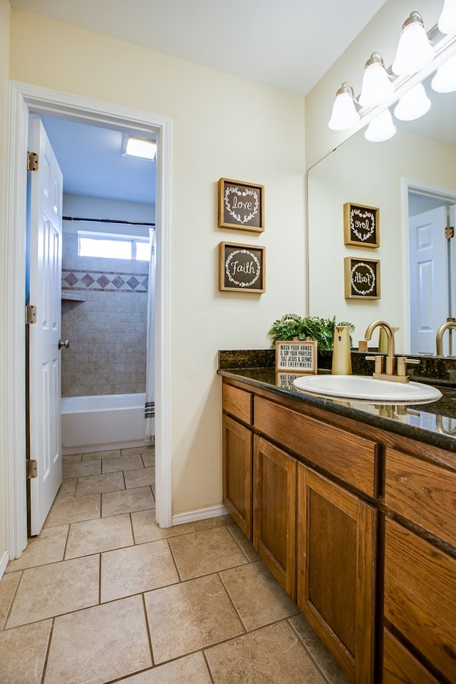 4974 Scarlet Oak Dr, San Angelo, TX 76904 - full bath with vanity and washtub / shower combination