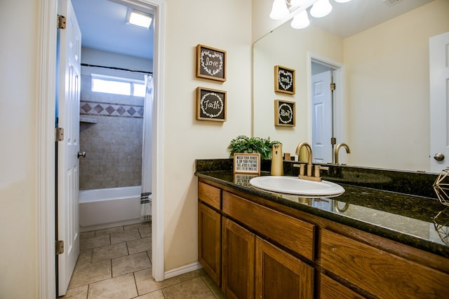 4974 Scarlet Oak Dr, San Angelo, TX 76904 - bathroom featuring vanity, tile patterned floors, and shower / bath combo