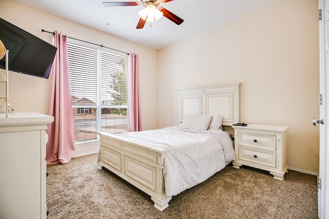 4974 Scarlet Oak Dr, San Angelo, TX 76904 - bedroom with light carpet and a ceiling fan