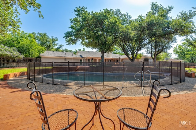 2305 Douglas Dr, San Angelo, TX 76904 - view of pool with a patio area