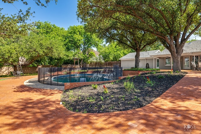 2305 Douglas Dr, San Angelo, TX 76904 - surrounding community with a pool and a patio area