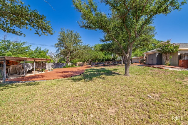 2305 Douglas Dr, San Angelo, TX 76904 - view of yard with an outbuilding and a patio area