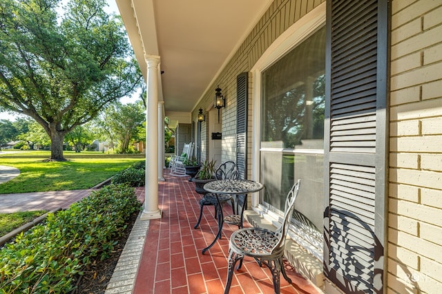 2305 Douglas Dr, San Angelo, TX 76904 - porch featuring a yard