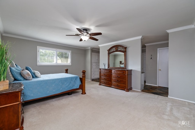 2305 Douglas Dr, San Angelo, TX 76904 - carpeted bedroom featuring ornamental molding, a ceiling fan, and baseboards
