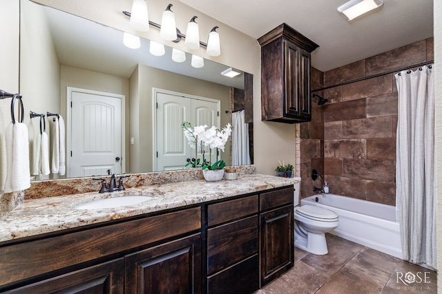 bathroom featuring shower / bath combo with shower curtain, vanity, and toilet