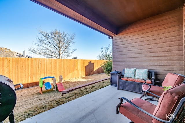 view of patio / terrace featuring fence and outdoor lounge area