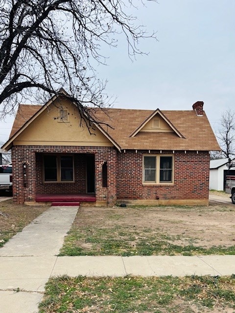 view of front of house with covered porch