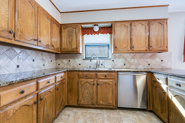 kitchen featuring sink, crown molding, dark stone countertops, tasteful backsplash, and stainless steel dishwasher