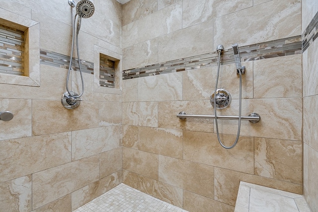 bathroom featuring tiled shower