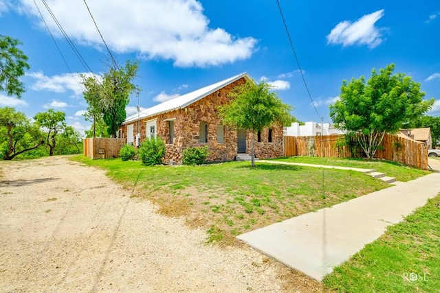 415 E Harris Ave, San Angelo, TX 79903 - view of front facade featuring stone siding