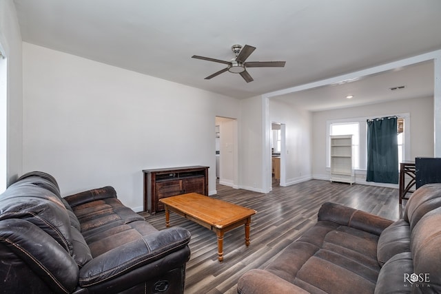 415 E Harris Ave, San Angelo, TX 79903 - living area featuring a ceiling fan and dark wood-type flooring