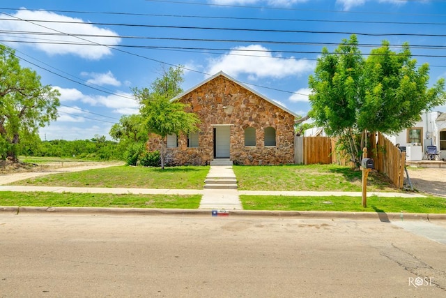415 E Harris Ave, San Angelo, TX 79903 - obstructed view of property with stone siding