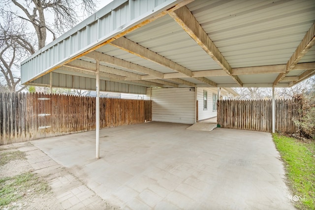 view of patio / terrace featuring a carport