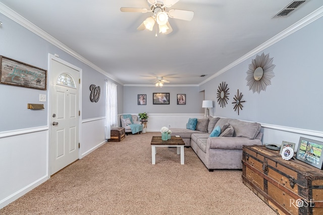 1951 W Twohig Ave, San Angelo, TX 76901 - living room with ceiling fan, light colored carpet, and ornamental molding