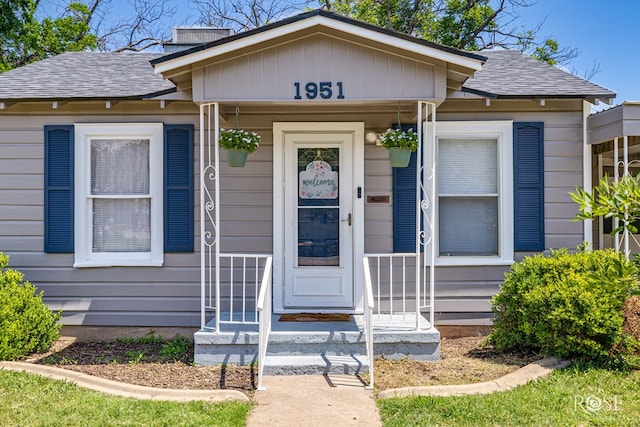 1951 W Twohig Ave, San Angelo, TX 76901 - view of front facade with a shingled roof
