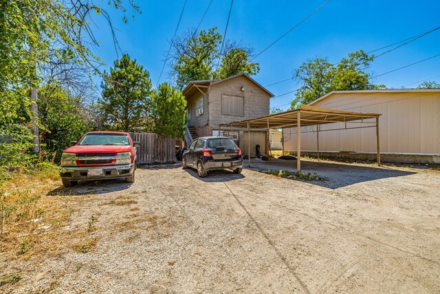 view of parking featuring a carport