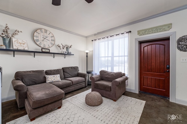 living room featuring concrete floors, crown molding, baseboards, and ceiling fan