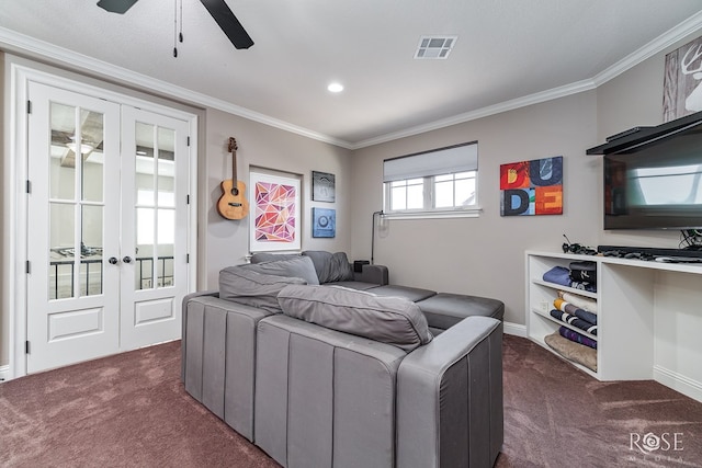 bedroom with ornamental molding, french doors, visible vents, and dark carpet