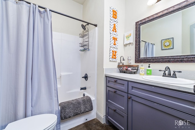 bathroom featuring shower / bathtub combination with curtain, toilet, and vanity