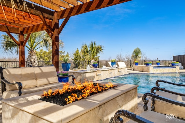 view of swimming pool with a fenced in pool, a fire pit, and a pergola