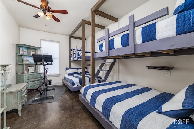 bedroom featuring concrete floors