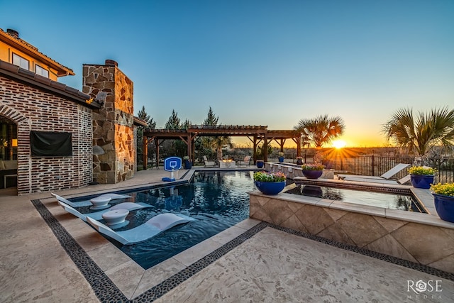 view of pool featuring a hot tub, a fenced in pool, fence, a patio area, and a pergola