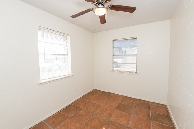 empty room featuring ceiling fan