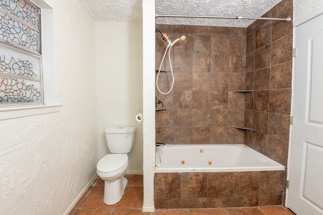 bathroom with toilet and tiled shower / bath combo