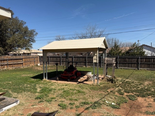 view of yard with a fenced backyard