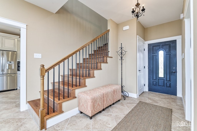 3045 Red Bluff Cir, San Angelo, TX 76904 - foyer entrance featuring stairs, light tile patterned floors, and baseboards