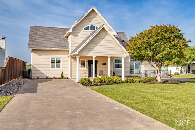3045 Red Bluff Cir, San Angelo, TX 76904 - view of front facade featuring covered porch, a shingled roof, and central AC unit