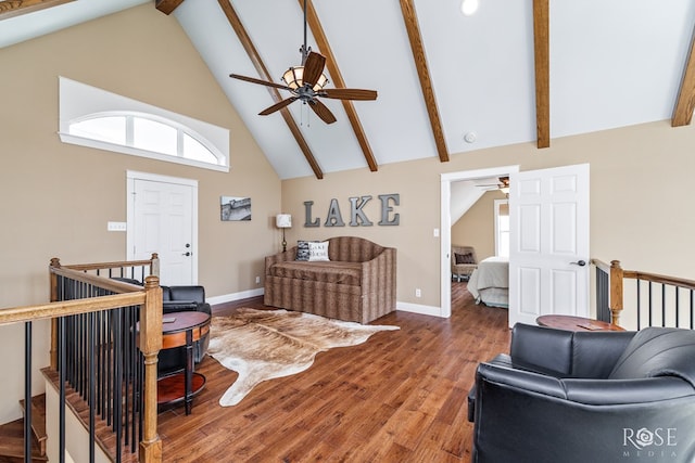 3045 Red Bluff Cir, San Angelo, TX 76904 - living room with ceiling fan, high vaulted ceiling, wood finished floors, beam ceiling, and baseboards