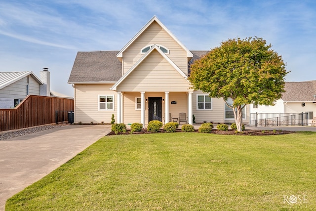3045 Red Bluff Cir, San Angelo, TX 76904 - view of front of property featuring roof with shingles, a porch, and concrete driveway