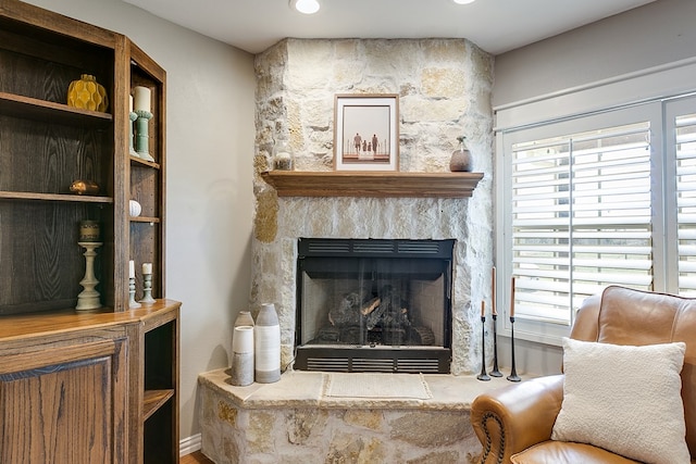 interior space featuring a stone fireplace