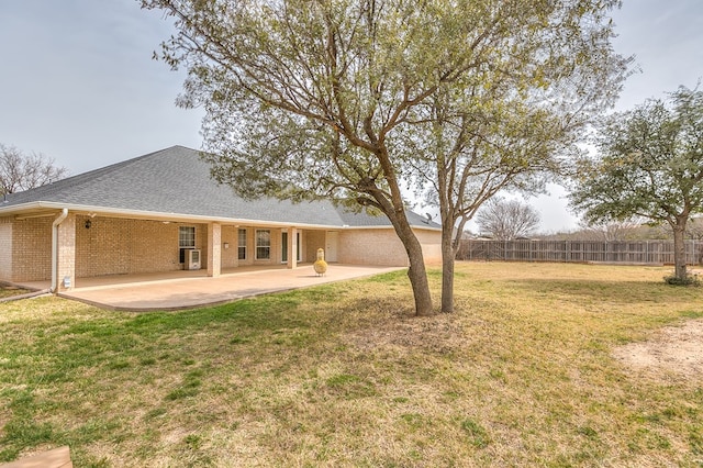 view of yard with a patio and fence