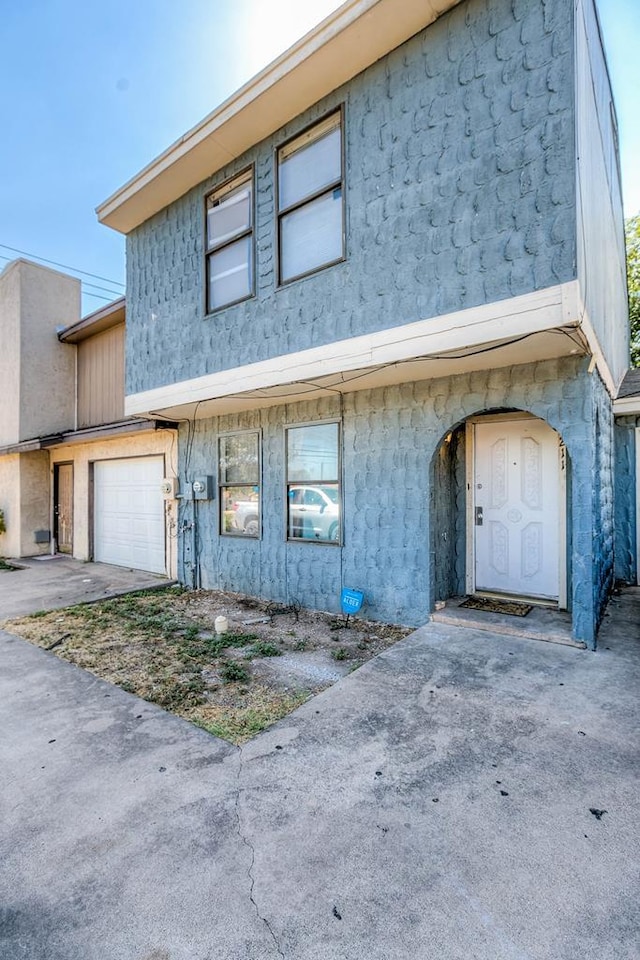 view of front of house with a garage