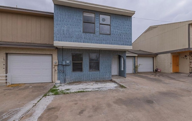 view of property featuring a garage