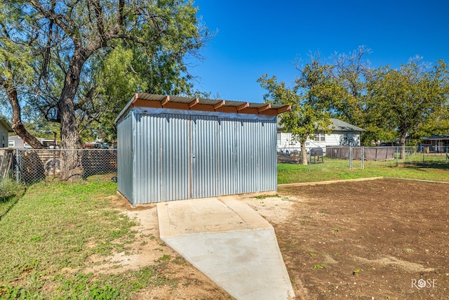 view of outdoor structure with a yard