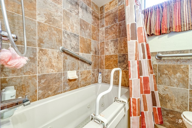 bathroom with tile walls and toilet