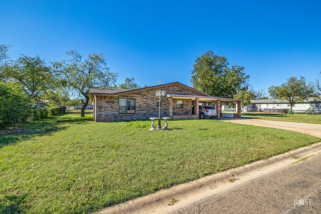 ranch-style house with a carport and a front yard